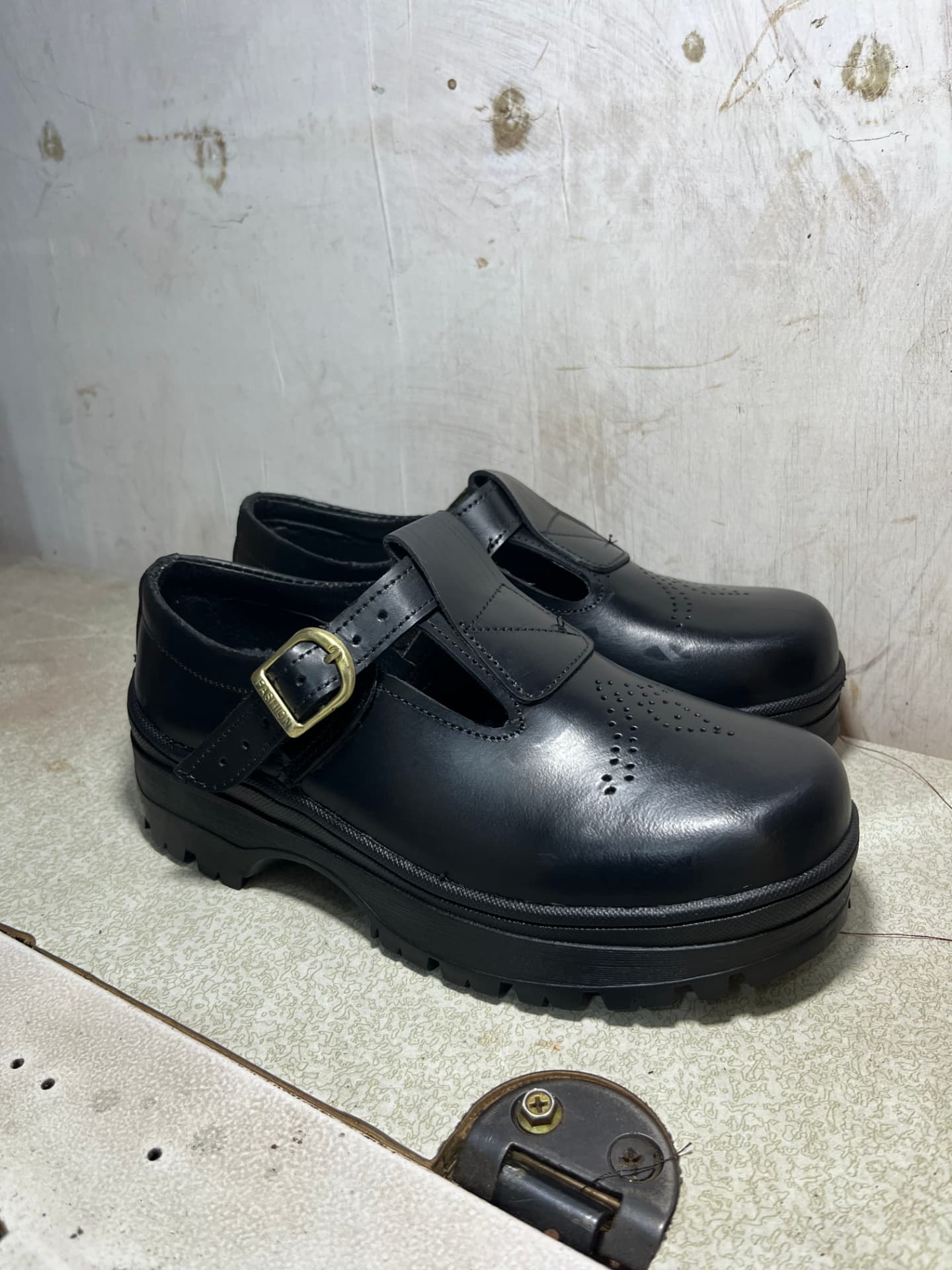 Handcrafted Fiti Soles leather shoes on the workshop bench